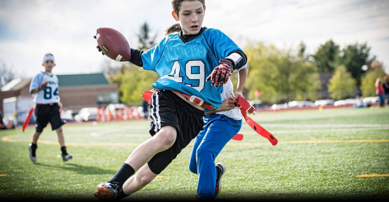 Play flag football with BYS - backyard sports